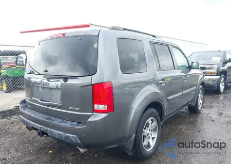 2010 Honda Pilot Touring z USA, uszkodzony, nr VIN 5FNYF3H9XAB007496
